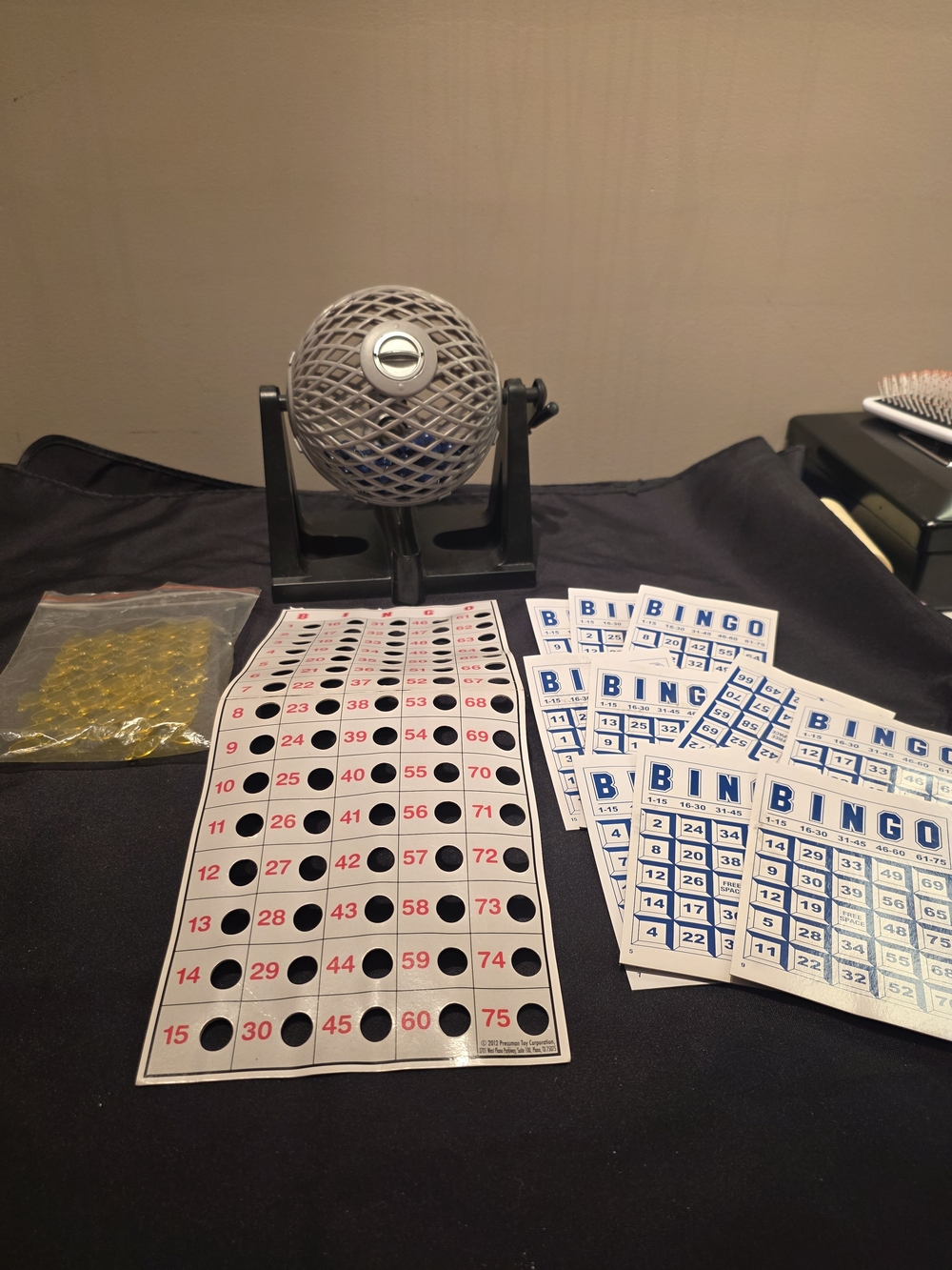 Black and Silver Manual Bingo Cage with Blue Bingo Cards